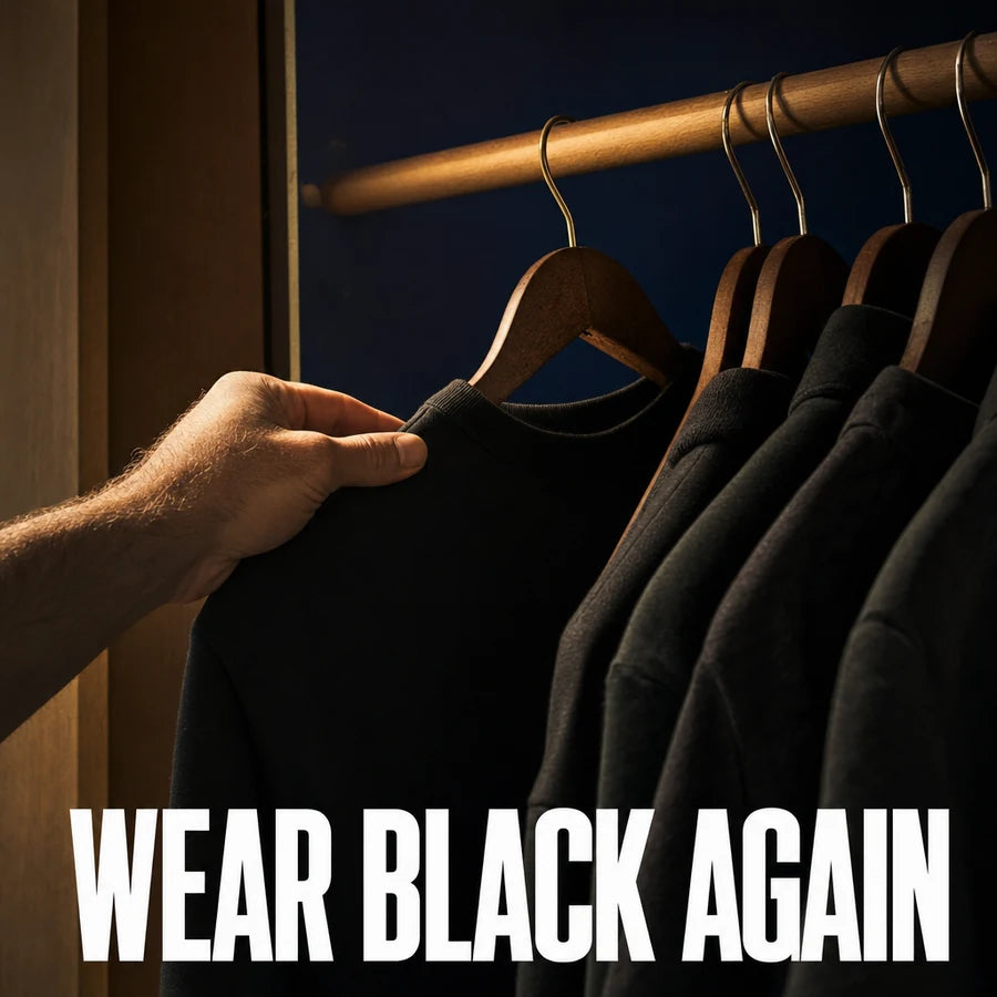 Rail of black clothes, one being chosen